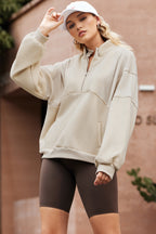 Apricot Half Zip Stand Collar Exposed Seam Solid Color Casual Sweatshirt
